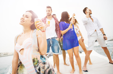 Group of friends making party on a yacht in Dubai