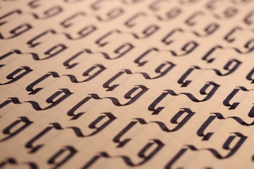 Lettering practice writing worksheet. Handwriting symbol filling pattern. Calligraphic letter G...