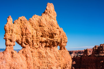Hoo-doos and rock formations are formed in the sandstone from erosion over the centuries and comprise the colorful view at Bryce Canyon National Park.