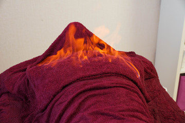 Tibetan fire massage. Traditional tibetan medicine, fire treatment and bodycare concept.