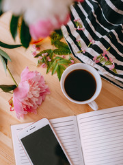 hands holding a cup of coffee