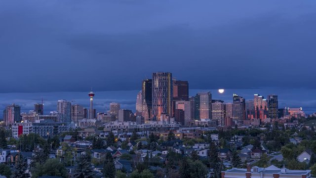 Night to day time-lapse of Calgary's skyline at sunrise. 