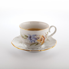 The cup of coffee isolated on white background. Top view at an angle. For design.