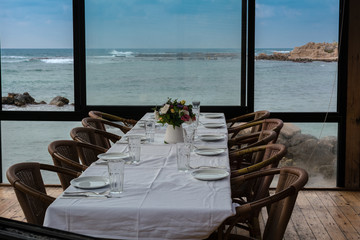 Restaurant at sea shore in Israel. Cafe table served