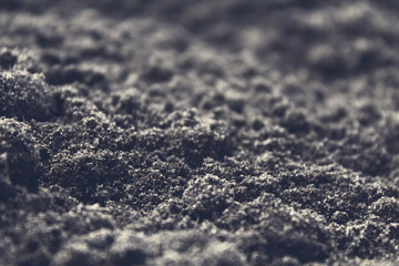 Black soil. Close-up. Background. Texture.