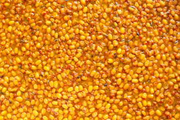 Fresh sea buckthorn jam. Close-up. Top view. Background. Texture.