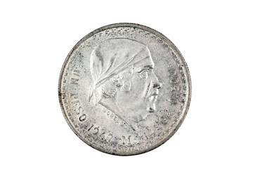 An old, 1947 silver one Mexican peso coin isolated on a white background, shot close up in macro