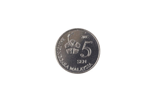 A close up, macro shot of a silver five sen coin from Malaysia isolated on a clean, white background