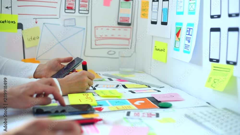 Poster Web designer is developing an application for mobile phones. Creating a layout of the user interface functions of smartphones.  