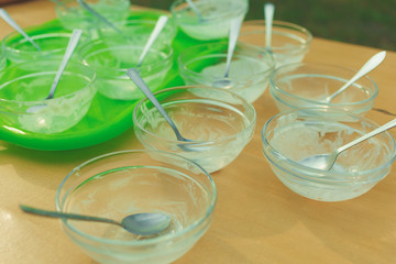 Empty dirty plates with spoon on the table.
