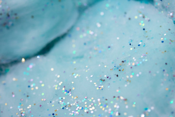 Ethereal Fluffy Blue Clouds with Glitter Background