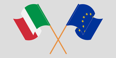 Crossed and waving flags of Italy and the EU