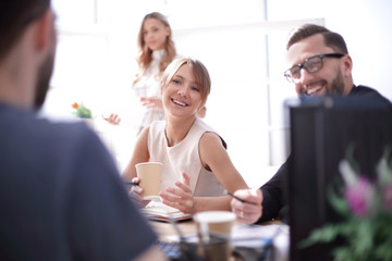 young business woman sitting at office Desk