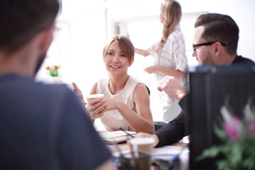 young business woman sitting at office Desk