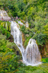 Fototapeta na wymiar Beautiful view of the most famous waterfalls in the sunshine in Plitvice National Park, Croatia