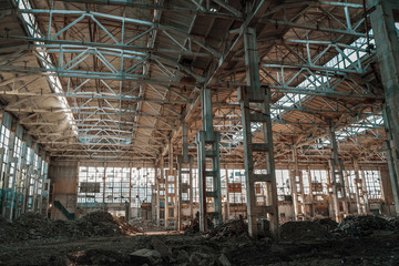 Ruined industrial hall of warehouse or hangar in process of reconstruction