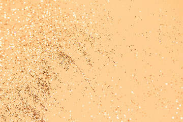 Glitter and sparkles shining backdrop for new year. Trendy christmas and holidays golden blurred festive background. Flatlay, copy space