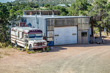 Abandoned and discarded old bus on a New Mexico country road
