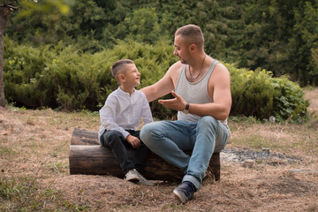 father and son are talking