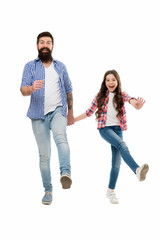 Following fathers example. On same wave concept. Bearded father and small child walking or running together. Move on. Lets move. Kid and dad cheerful friends in motion. Move in same direction