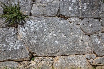 The ancient megalithic walls surround the acropolis of Amelia, in Umbria, Italy. Texture composed...