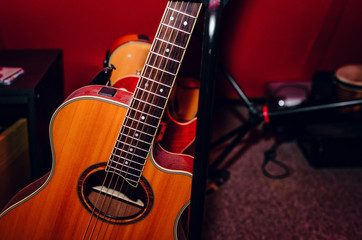 A set of classical and electric guitars. Music concept. Guitars for musicians, sale of guitars, musical instruments. Playing musical instruments, creating.