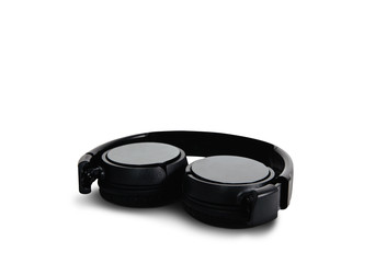 Black headphones isolated on white. The concept of creating and listening to music. Comfortable headphones for listening to music. Creating sounds and listening to the foundations.