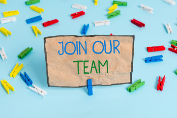 Handwriting text writing Join Our Team. Conceptual photo inviting someone to join in your local group or company Colored clothespin papers empty reminder blue floor background office pin