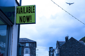 Writing note showing Available Now. Business concept for you can find it obtain or operable at this current moment Green ad board on the street with copy space for advertisement