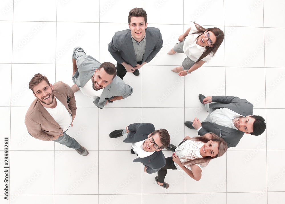 Wall mural top view.a group of happy young people