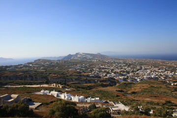 Fototapeta na wymiar Panorama of Santorini stretching from the town of Pyrgos