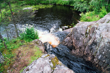 Ruskeala waterfalls on the tokhmayoki river . Karelia.