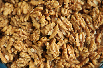 Walnut. Background of a large number of new crop nuts