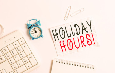 Writing note showing Holiday Hours. Business concept for Overtime work on for employees under...