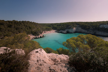 Cala Mitjana and Cala Mitjaneta beaches at the south coast of Menorca Island, Spain.