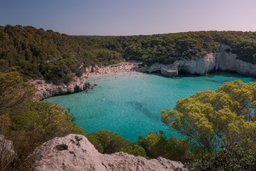 Fototapeta na wymiar Cala Mitjana and Cala Mitjaneta beaches at the south coast of Menorca Island, Spain.