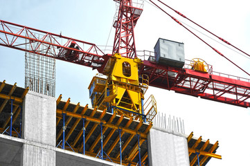 Crane and highrise construction site