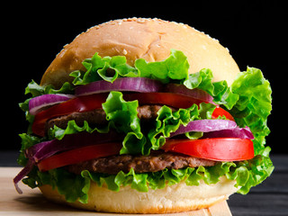 Burger served in bun in nutrition fast food concept