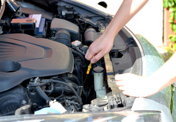 Fototapeta na wymiar Checking the oil level in engine