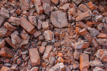 Broken brick at a construction site. Construction waste after dismantling.