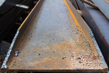 Gas burner cut on steel channel. The use of steel channel to strengthen the foundation of the house in a construction site.