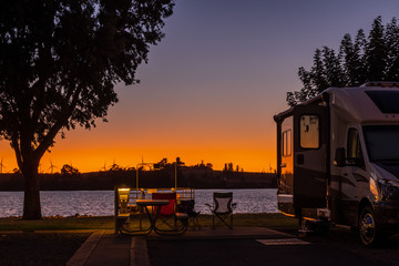 Sunset sky at a Rv park in Rio Vista, Ca. in the delta water way - Powered by Adobe