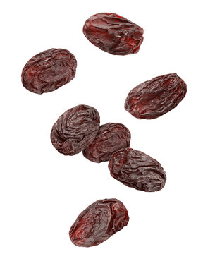Falling raisin isolated on white background, clipping path, full depth of field