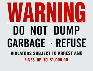 WARNING sign-DO NOT DUMP GARBAGE OR REFUSE.