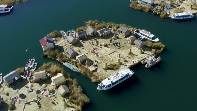 Aerial landscape around floating islands of Uros Village in Lake Titicaca, Puno, Peru