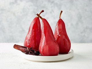 Pears poached in red wine