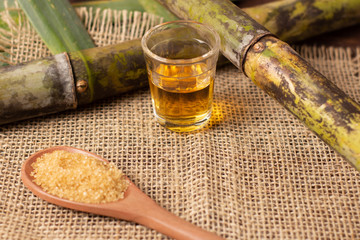 Cachaça is the name of a typical alcoholic drink produced in Brazil maked with sugarcane....