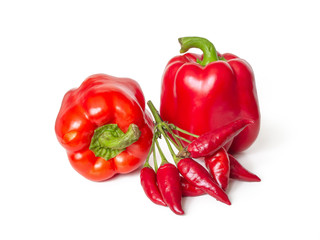 Red hot chili and two red bell peppers
