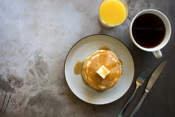 Pancakes with coffee and orange juice