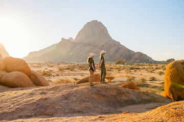 Kids hiking in Spitzkoppe Namibia